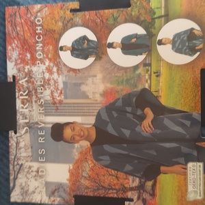 New Serra reversible poncho shades of blue